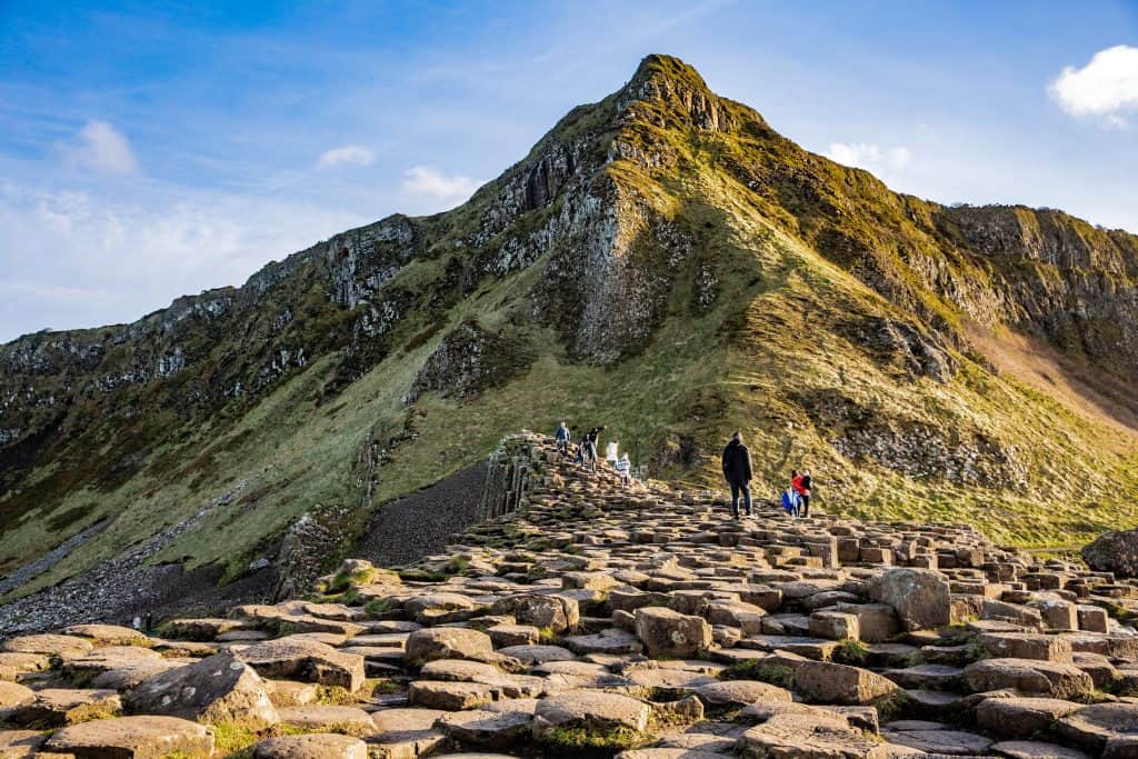 person standing behind mountain